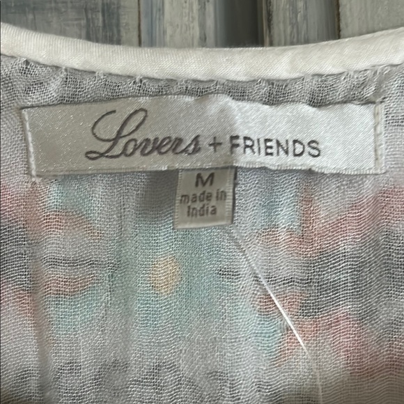 Embroidered Sleeveless White Dress - Picture 4 of 9